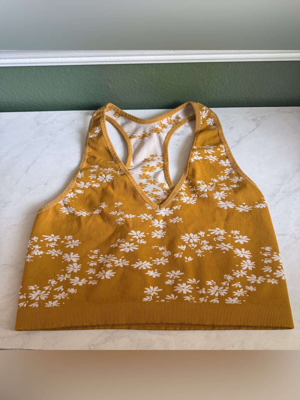 FP Movement by Free People Mustard Floral V‑Neck Racerback Crop Top